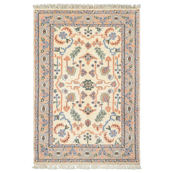 Ivory Indo-Persian hand-knotted wool rug 6x9 with peach, blue, and mint floral motifs — plush 1-inch pile oriental rug for elegant living room décor